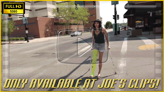 Natasha’s Straight Yellow LLC - In this shoot she’s in a straight yellow LLC with black toenails and short shorts. She crutches around a city block, stopping occasionally to prop her cast up. Then she practices crutching around a parking lot as...